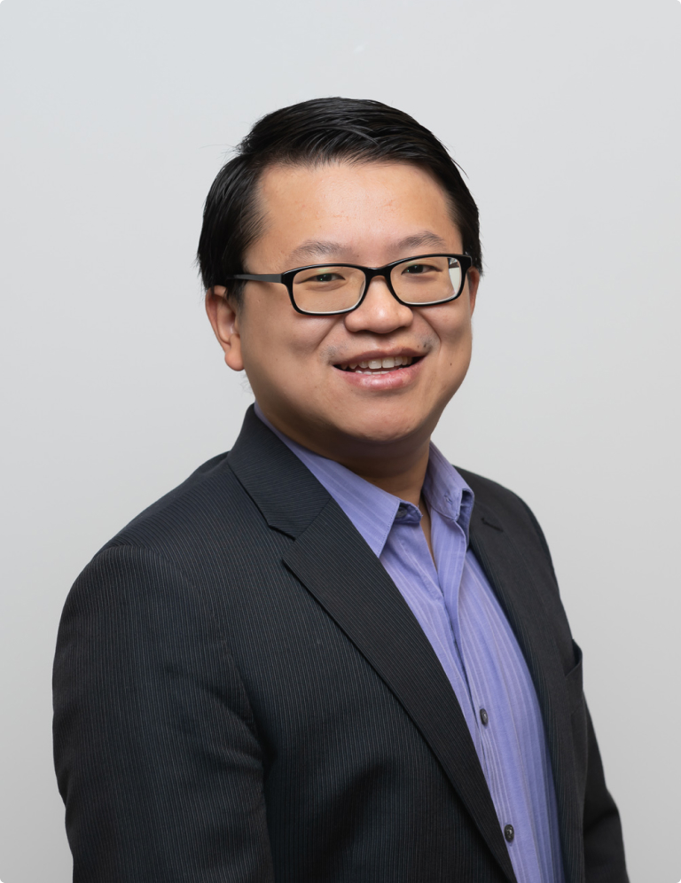 A profile shot of Ed Wei